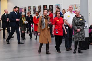 Legal battle over Harry's US visa documents reopens as William meets farmers - live Anne walks through the atrium of Southmead Hospital’s Brunel Building (Ben Birchall/PA)